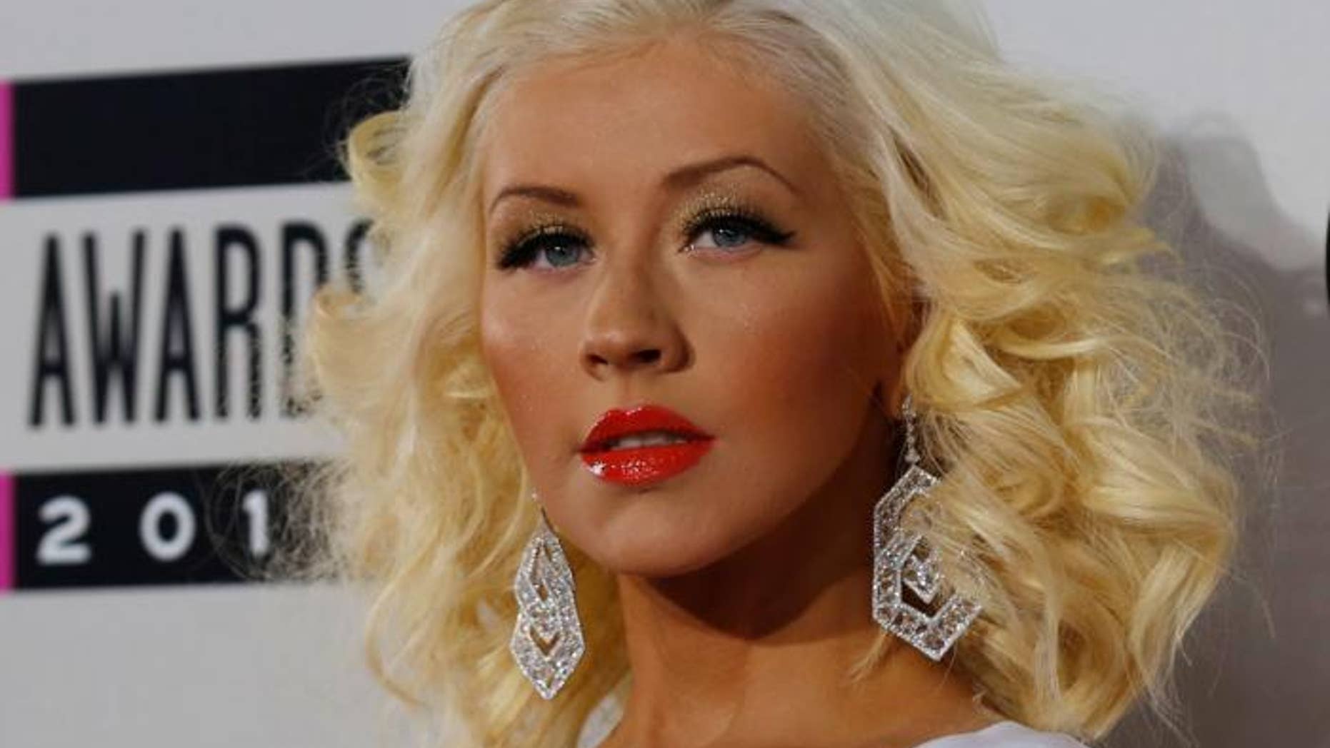 Christina Aguilera: Fans Claim Extensive Photoshopping In Recent Photoshoot Christina Aguilera: Fans Claim Extensive Photoshopping In Recent Photoshoot