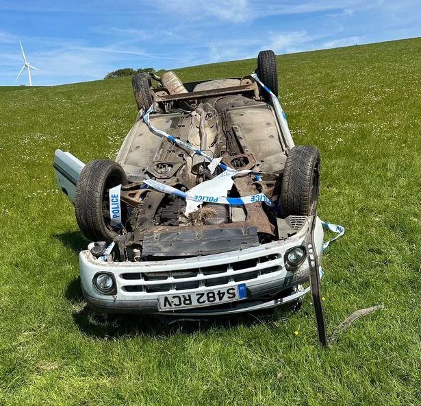 Emergency Services Respond To M56 Crash: Car Overturn And Casualty Emergency Services Respond To M56 Crash: Car Overturn And Casualty