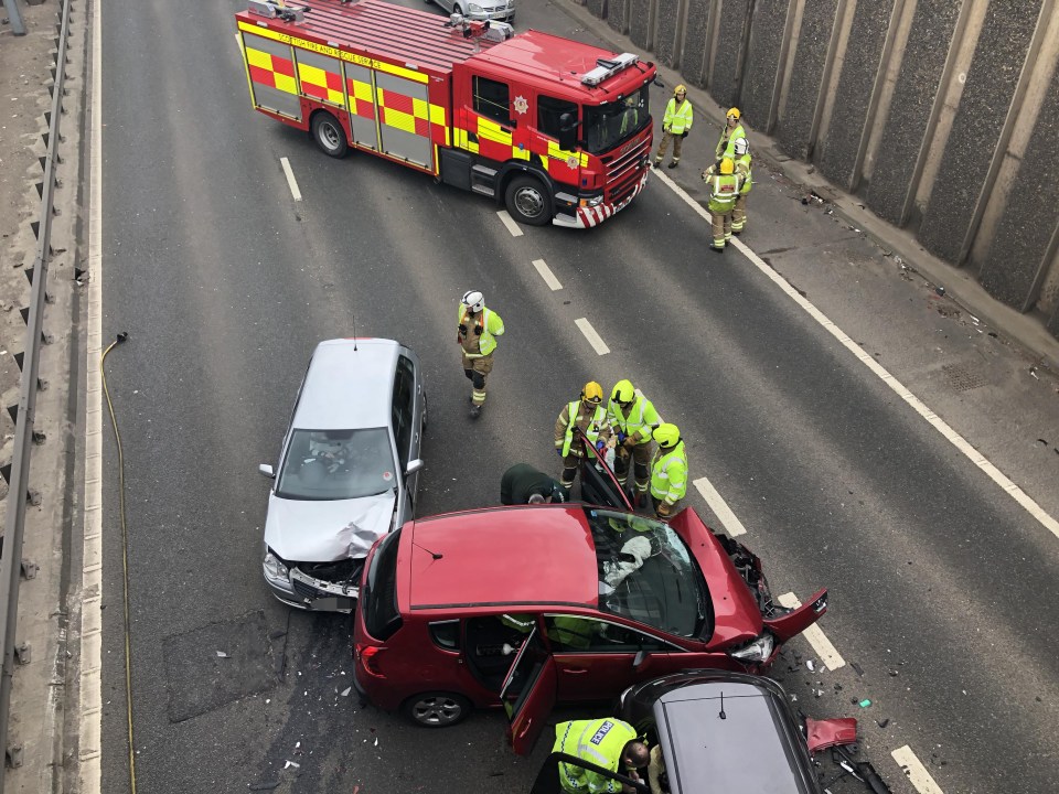 M56 Car Crash: Overturned Vehicle, Casualty Treated On Motorway M56 Car Crash: Overturned Vehicle, Casualty Treated On Motorway